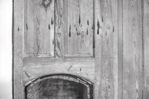 Paneled fireplace wall, hall chamber, 1792. Flame marks from can